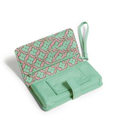 Combining sleek design with practical functionality, this wristlet keeps your phone and essentials within easy reach, ensuring you stay connected in style. Outlet Exclusive Interior features eight card slip pockets, a zip pocket and a phone pocket Snap closure. Dimensions: 6. 75" w x 3. 75" h Handle/Strap Wrist strap drop 6. 0" Vera Bradley Outlet Women's Phone Wristlet in Beryl Green Work Backpack, Phone Wristlet, Weekend Travel Bags, Medium Backpack, Belt Purse, Travel Duffel, Flip Flop Slippers, Small Backpack, Toiletry Bag Travel