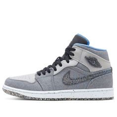 The iconic Air Jordan 1 Mid Crater Grey University Blue is back and better than ever! This timeless sneaker features a sleek two-toned, grey-based upper crafted from soft cotton and partially recycled material that’s sure to turn heads. The light grey upper is complimented by cropped University Blue accents on the collar, tongue lining, and Swoosh logos with zig-zag contrast stitching for standout style. Underfoot lies the comfort of Nike’s Crater Foam midsole combined with a durable Nike Grind outsole for superior traction. For those who love classic style but also appreciate sustainability, this iconic Air Jordan 1 Mid is a must-have for any shoe collection. (AJ1/SNKR/Retro/Men's/Mid Top/Basketball/Recyclable Materials) Air Jordan 1 Mid Se, Recyclable Materials, Retro Men, Mid Top, University Blue, Air Jordan 1 Mid, Jordan 1 Mid, Blue Accents, Contrast Stitch