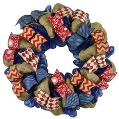 a red, white and blue wreath with bows