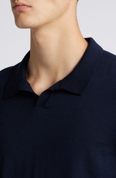 Lightweight and layerable, this polo-style sweater crafted from breathable wool features a sporty V-neck collar and a relaxed fit for day-to-night comfort. 27 1/2" length (size Medium) Johnny collar Long sleeves Ribbed cuffs and hem 100% virgin wool Machine wash, dry flat Made in Turkey Blue Wool Collared Top, Casual Blue Merino Wool Polo Sweater, Casual Merino Wool Polo Shirt, Blue Merino Wool Polo Sweater With Ribbed Collar, Casual Merino Wool Polo Sweater With Polo Collar, Navy Polo Collar Top For Winter, Casual Merino Wool Polo Sweater With Collar, Casual Merino Wool Polo Sweater With Seamless Collar, Classic Merino Wool Polo Sweater With Seamless Collar