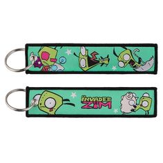 two keychains with cartoon characters on them, one is green and the other is black