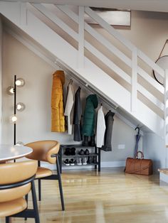 a room that has some clothes hanging on the wall