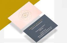 two business cards on top of each other with an abstract design in the middle and bottom