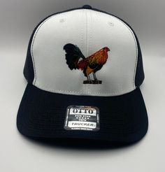 Enjoy this extra hat yourself or save it as a present for someone special this holiday seasoning.  Minimal variation for the position of the logo EMBROIDERED IN USA Your hat is mailed in a box 📦 Please make sure you choose the number matched with the color of the hat Custom Black Hats As Gifts, Number Matching, Logo Embroidered, In A Box, Trucker Cap, A Box, Rooster, Caps Hats, San Diego