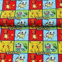 the pokemon fabric has many different images on it