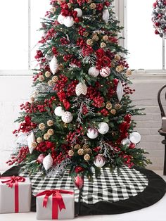 a christmas tree decorated with red and white ornaments