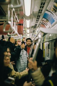 many people are riding on the subway train