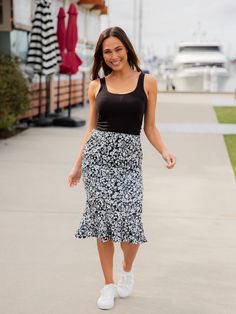 Hey there fashion lovers! Are you ready to add some fresh prints to your wardrobe? Our new Patterned Ruffle Hem Pencil Skirt is just what you need! This beautiful skirt will give your outfit a pop of color and flowy movement that will make you feel like a fashion icon. Pair it with a basic tee, jean jacket, and booties for a stylish and effortless look that will turn heads. Whether you're going out with friends or running errands, the Patterned Ruffle Hem Pencil Skirt is perfect for any occasion Beautiful Skirt, Maxi Skirt Dress, Graphic Apparel, Beautiful Skirts, Fashion Icon, Knee Length Dresses, Knee Length Skirt, Hey There, Basic Tee