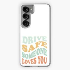 a white phone case with the words drive safe someone loves you in orange and green