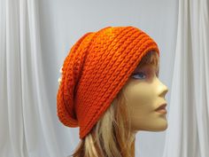 Handmade Orange Wool Crochet Beanie - Slouchy Winter Hat Stay cozy and stylish this winter with this handmade crochet beanie! This slouchy wool hat in a vibrant orange is the perfect accessory to add a pop of color to your cold-weather wardrobe. Made with high-quality yarn, this hat will keep you warm and fashionable all season long.  Whether you're hitting the slopes or just running errands around town, this crochet beanie is a must-have item for any winter outfit. Add a touch of handmade charm Slouchy Winter Hat, Beanie Slouchy, Crochet Bonnet, Bonnet Au Crochet, Slouch Beanie Hats, Orange Beanie, Wool Crochet, Bonnet Crochet, Slouch Beanie