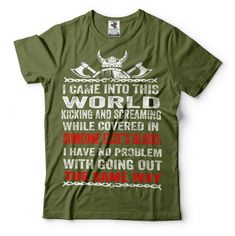 a green t - shirt that says i came into this world kicking and screaming while covered in barbed wire