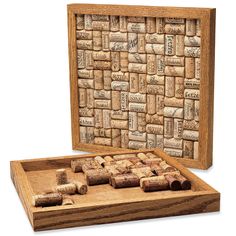 a wooden box with wine corks in it and the lid opened to reveal an image