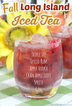 fall long island iced tea recipe in a glass on a table with sunflowers