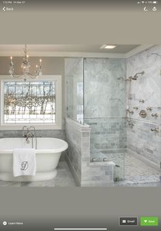 a white bath tub sitting next to a window