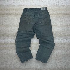 "Vintage Levis Silver Tab Jeans Olive Green Wash Denim Made in USA Loose Fit Distressed 90s Skate / Streetwear Great Condition: 7/10 (small marks, aka some character) Men's Size:  Waist: 36\" Length (inseam): 30\" Leg Opening: 8\" Thigh Opening: 13.5\" Front Rise: 12.5\"" Casual Dark Wash Reworked Jeans, Casual Reworked Dark Wash Jeans, Vintage Distressed Bottoms For Fall, Casual Dark Wash Reworked Bottoms, Casual Reworked Medium Wash Bottoms, Casual Reworked Dark Wash Bottoms, Casual Reworked Medium Wash Jeans, Vintage Washed Black Bottoms With Five Pockets, Vintage Acid Wash Bottoms With Pockets