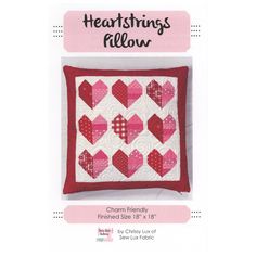 the heart pillow pattern is shown in red and white, with pink hearts on it