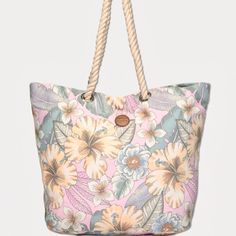 A Large Beautiful, Versatile Floral Print Tote Bag, Great For Shopping, Beach Or For Every Day Use. The Soft Canvas Fabric Bag Comes With Thick Double Handles For Comfort, Is Lined, Has Inner Zipper Pocket, And Easy Snap Closure. Construction Soft Woven Durable Canvas Fabric All Over Printed Colorful Tropical Floral Design Round Faux Leather Detail With Emboss Skechers Logo Large Roomy Interior Soft Fabric Top Handle With 10 Inch Drop Height 15” H X 20” Upper Length, 15.5”Base Length X 7”D Vacation Canvas Bags, Casual Yellow Shoulder Bag For Beach Season, Casual Multicolor Pouch Beach Bag, Casual Yellow Beach Shoulder Bag, Casual Yellow Shoulder Beach Bag, Casual Yellow Beach Bag, Multicolor Pouch Beach Bag, Yellow Canvas Bag For Spring Travel, Canvas Shoulder Bag For Beach