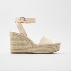 Zara Ecru Jute Leather Espadrille Wedges Zara Bloggers Fave Leather Ecru Wedge Sandal, Leather Upper, Wraparound Ankle Strap Closure, Jute Lined Wedge, Heel Height 3.7 Inches Us10/Eur41 Tag: Zara Bloggers Favorite, Zara Ecru, Zara Sandals, Zara Wedge, Zara Espadrilles, Summer Sandals, Wedge Sandals, Espadrilles Wedge, Leather Sandals, Leather Wedge Sandals, Nude Sandals, Off White Sandals Chic Cream Espadrilles With Ankle Strap, Cream Ankle Strap Platform Espadrilles, Cream Platform Espadrilles With Ankle Strap, Chic Beige High Heel Espadrilles, Cream Leather Espadrilles For Beach, Cream Leather Espadrilles For The Beach, Cream High Heel Espadrilles For Spring, Cream Leather Open Toe Espadrilles, Zara Wedge Sandals With Platform