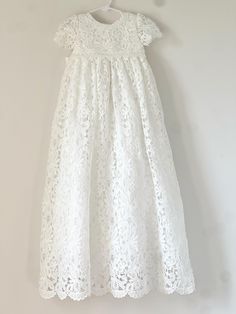 A timeless heirloom, our gorgeously made vintage inspired gown is perfect for your little's special event. Featuring delicate crocheted lace, made perfect with a cotton/linen liner to ensure comfort. This is a complete set consisting of the gown and coordinating bonnet in our extended heirloom length. Also available in shorter lengths. White Pastoral Wedding Dresses, Classic Lace Baptism Dress For Ceremony, Vintage Lace Baptism Dress For First Communion, Classic First Communion Dress With Lace Trim For Baptism, Classic First Communion Dress With Lace Trim, Vintage Lace Baptism Dress, Heirloom Baptismal Gowns, White Lace Trim Baptism Dress For Babies, White Cotton Baptism Gown