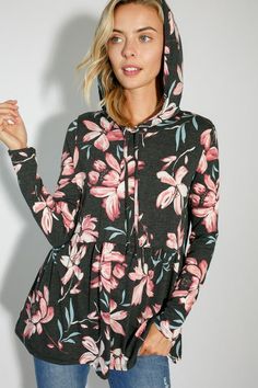 FLORAL PRINT JERSEY BABYDOLL WITH HOODIE CASUAL TOP- Floral print jersey babydoll with hoodie casual top- Long sleeve- Hoodie with self drawstring- Relaxed fit tunic length- Floral print jersey- Model is 5' 8" 31-24-35 and wearing a Small- 87% POLYESTER, 10% RAYON, 3% SPANDEX- MADE IN U.S.A Style: Casual Print / Pattern: Floral print Fit: Relaxed fit Embellishment: Hoodie Sleeve: Long sleeve Lining: No Made In: United StatesFabric Contents: 86% POLYESTER, 10% RAYON, 4% SPANDEXNon-sheer fabricCare Instructions: Machine wash cold, Do not bleachSize Measurement (inch): S: 36.0-38.0 (Bust), null (Waist), null (Hips), null (Length) M: 38.0-40.0 (Bust), null (Waist), null (Hips), null (Length) L: 40.0-42.0 (Bust), null (Waist), null (Hips), null (Length) Cute Long Sleeve Top With Drawstring Hood, Casual Long Sleeve Tops With Drawstring Hood, Casual Drawstring Hoodie Top, Spring Tops With Drawstring Hood And Relaxed Fit, Drawstring Hooded Tops For Loungewear, Hooded Drawstring Tops For Loungewear, Casual Loungewear Top With Drawstring Hood, Casual Tops With Drawstring Hood For Loungewear, Spring Gray Stretch Hoodie