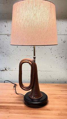 a lamp that is on top of a table