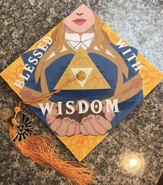 a graduation cap with the words, blessing and an image of a woman