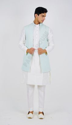 This item is made specially for you by hands with love  Item contains : kurta jackets and  pants  Fabrics :   Silk Colours :  kurta and pants white jacket sea green   Style and Designs :  kurta have mandarin collar and long sleeves with a full button placket symmetric hem and multiple slits  jacket also have mandarin collar open front style and multiple slits White coloured solid churidar has a drawstring closure with nara  Size :  Slim fit  Model height is 6 fit and wearing 40 size  Material an Spring Designer Nehru Jacket With Cutdana, Spring Long Sleeve Nehru Jacket With Cutdana, Festive Long Sleeve Pista Green Nehru Jacket, Festival Green Nehru Jacket With Dabka Detail, Luxury Off-white Nehru Jacket With Cutdana Detailing, Kurta And Pants, House Clothes, Green Style, Pants White