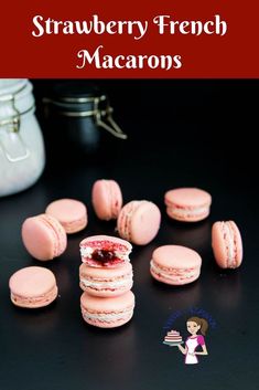 strawberry french macarons are stacked on top of each other