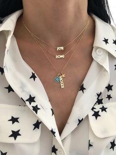 This adorable small name necklace is the perfect accessory! It looks great alone or layered with other necklaces. UPPERCASE letters only. FOR ♥ PLACEMENT PLEASE CUT AND PASTE ♥ AND INSERT IT IN THE TEXT BOX. 14K Yellow Gold, 14K White Gold or 14K Rose Gold Height: Approx. 1/4" Length: Based on number of letters - up to 8 allowed ALL UPPERCASE LETTERS ONLY FINAL SALE Necklace Names Ideas, Name Necklace Layered, Name Plate Necklace, Arabic Necklace, Cheap Necklaces, Plate Necklace, Text Box, Uppercase Letters