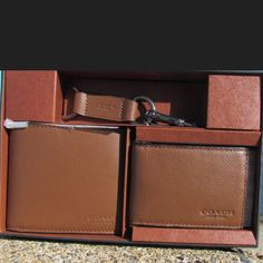 Brand New In Box Men’s Gift Set Of Wallet, Id Case And Keychain By Coach Done In Gorgeous Brown Leather (Coach Lists The Color As “Dark Saddle”). All Three Pieces Are Stamped “Coach New York”. Original Retail $225. Coach Wallets With Rfid Blocking As Gift, Rectangular Cognac Wallet Perfect For Gifts, Cognac Rectangular Wallet For Gift, Cognac Rectangular Wallet Perfect For Gifts, Brown Wallet As A Gift, Coach Rectangular Wallets As Gift, Luxury Coach Rectangular Wallets, Coach Brown Rectangular Wallet, Coach Wallet With Coin Pocket For Gift