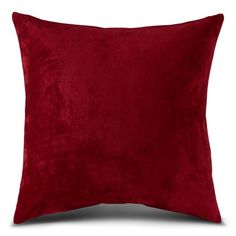 a red pillow on a white background