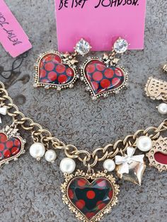 Rare Betsey Johnson Jewelry Polka dot Lucite Heart bracelet and earring set New Old stock Marked  Rare and hard to find ❤️🖤 *Shipping Can include - packing materials, fees, ship confirmation, etc. (Etsy charges Fees on shipping as well).  thank you for understanding.  Please see my shop for more rare antique and vintage pieces. Antique and costume jewelry, rhinestone and beaded handbags, and collectibles! Dot Heart, Vintage Jewelry Repurposed, Bracelet And Earring Set, Hawaiian Jewelry, Coral Bracelet, Repurposed Jewelry, Beaded Handbag, Betsey Johnson Jewelry, Vintage Pieces