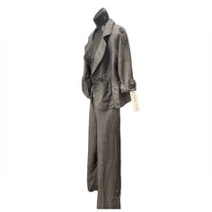 Dark Gray| Textured| Recycled Acrylic Metallic Lana Material| Quarter Sleeve| Suit| Blazer And Pants Set| Size: M| 2 Pant Pockets| 2 Blazer Pockets| V Cut| Button Up Blazer| Fitted Spring Pantsuit With Notch Lapel And Buttons, Chic Tailored Pantsuit With Buttons, Chic Fall Pantsuit With Buttons, Single Breasted Wide Leg Fall Pantsuit, Wide Leg Pant Set For Workwear In Fall, Fall Single Breasted Wide Leg Pantsuit, Tailored Fall Pantsuit With Button Closure, Tailored Button Closure Pantsuit For Fall, Tailored Pantsuit With Button Closure For Fall