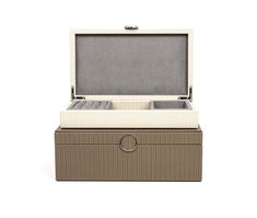 Turning elegance in a modern way. That's what we did with our Prestige jewellery box. Available in 3 different sizes, our unmistakable leather texture covers this box embellished with shiny gold details and finished with soft suede inside. Modern Rectangular Jewelry Storage With Box, Modern Rectangular Jewelry Storage Box Included, Luxury Rectangular Jewelry Storage For Formal Use, Luxury Rectangular Jewelry Storage For Formal Occasion, Luxury Rectangular Jewelry Storage Gift Box, Luxury Jewelry Storage Box, Rectangular, Luxury Jewelry Storage Gift Box, Elegant Rectangular Jewelry Storage, Leather Texture