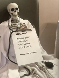 a skeleton with a stethoscope is holding a sign that says, welcome no wait time take a seat grab a drink have a snack