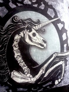 a black and white drawing of a unicorn