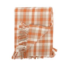 an orange and white checkered blanket with fringes on the ends, folded up