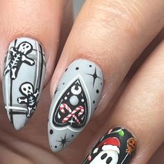 Wisconsin Nail Artist & Educator on Instagram: "Just creeping through the holidays 😏🖤 Day 2  @lightelegancehq ​​​​​​​​ ​​​​​​​​  #lightelegancegel #lightelegance #lefaves #lerocks #holidayseason #holidaynails #christmas #christmasnails #lebuttercreams #spookychristmas #creepmas #nailart #handpainted #nailpro #leeducator #whatsinsidematters #nails #nailsoftheday #mke #mkenails #mkesalon #leeducator #mkexplore #almondnails" Spooky Winter Nails, Goth Christmas Nails Short, Christmas Horror Nails, Goth Xmas Nails, Krampus Nail Art, Home Alone Nails, Scary Christmas Nails, Horror Christmas Nails, Creepmas Nails