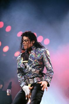 michael jackson performing on stage at an event