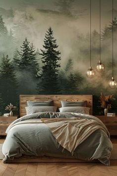 a bedroom with a forest mural on the wall