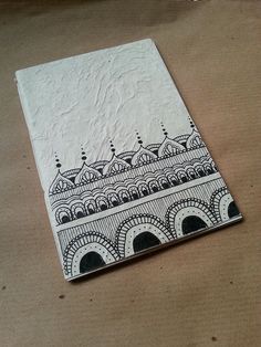 a piece of paper with an intricate design on it