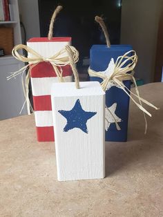 two wooden blocks with stars painted on them