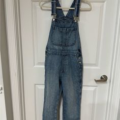 Jean Overalls Size Xs Light Wash Gap No Tags, But Remained Unworn Because Size Was Too Small. Gap Washed Denim Jeans, Casual Medium Wash Gap Jeans, Gap Blue Jeans, Gap Blue Jeans For Summer, Gap Blue High Rise Jeans, Gap High Rise Blue Jeans, Minion Games, Jean Overalls, Denim Overalls