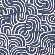 an abstract blue and white pattern with wavy lines on the surface, in varying sizes