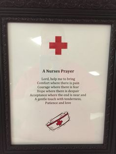 a framed sign with a red cross on it in front of a white background that says, a nurse's prayer