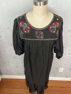 Vintage Sandy Starkman Boho Embroidered Caftan 100% Cotton Dress Made in India Please see measurements for Sizing ) I'm guessing size 8-10 in women's  Measurements in inches: Bust (underarm to underarm):  42 Shoulders:  15 Waist:  oversized Sleeve (underarm to hem):  10 Length (shoulder to bottom hem):  46.5 Black and multicolor Oversized Silhouette In Very Good Vintage Condition Thanks for looking! Long Dresses With Embroidered Sleeves, Multicolor Long Embroidered Dress, Embroidered Short Sleeve Dress For Festive Occasions, Summer Embroidered Dress With Yoke, Summer Embroidered Dress With Yoke Detail, Short Sleeve Embroidered Dress With Geometric Embroidery, Festive Geometric Embroidered Dress, Embroidered Fitted Tunic Kaftan, Festival Multicolor Embroidered Tunic Dress