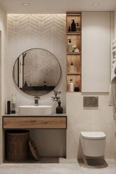 a bathroom with a toilet, sink and mirror in it's centerpieces