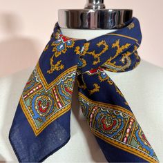 Vintage 70 80 Retro Cotton Navy Paisley Coachella Western Bandanna Scarf Vintage Western Bandanna In A Charming Retro Western Paisley Maximalism Design. Pattern Of Scrolling Paisleys And With A Series Of Boarder In Classic Colors Of Navy Blue Mustard Yellow Gold, And Real Red. Small Square Size That Is Perfect To Tie Around Your Neck, Around Your Head Or Anything That Needs A Little Retro. 100% Cotton Made In The Usa Excellent Condition Never Worn New Size Approximately 21 Inches Square Need Mor Maximalism Design, Western Paisley, Retro Western, Scarf Vintage, Maximalism, Blue Scarf, Vintage Western, Square Scarf, Vintage Accessories