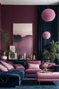 a living room with purple walls and blue carpeted flooring, two pink lanterns hanging from the ceiling