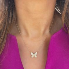 We know you'll absolutely fall in love with this necklace! A dainty 14k gold chain houses an exquisite handcrafted butterfly that glimmers and gleams from every angle. It’s simple yet sophisticated design allows for everyday wear. Metal: 14k White Gold / 14k Yellow Gold / 14k Rose Gold Round Brilliant Cut Natural Diamonds: Approx. 0.04 ctw Baguette Cut Natural Diamonds: Approx. 0.13 ctw G/H Color and SI1 Clarity Diamonds Length: 18 inches at the longest with jump rings at 16" & 17" Closure: Lobster Clasp Pendant Measurements: approx. 14.25mm x 11.10mm Looking for a different length? Please email us. Dainty 14k Gold Butterfly Necklace, Elegant Everyday Butterfly Charm Necklace, Elegant Everyday Butterfly Necklace, Dainty Yellow Gold Butterfly Necklace, College Rings, Mens Engagement, Band Bracelet, Tennis Necklace, Bridal Bands